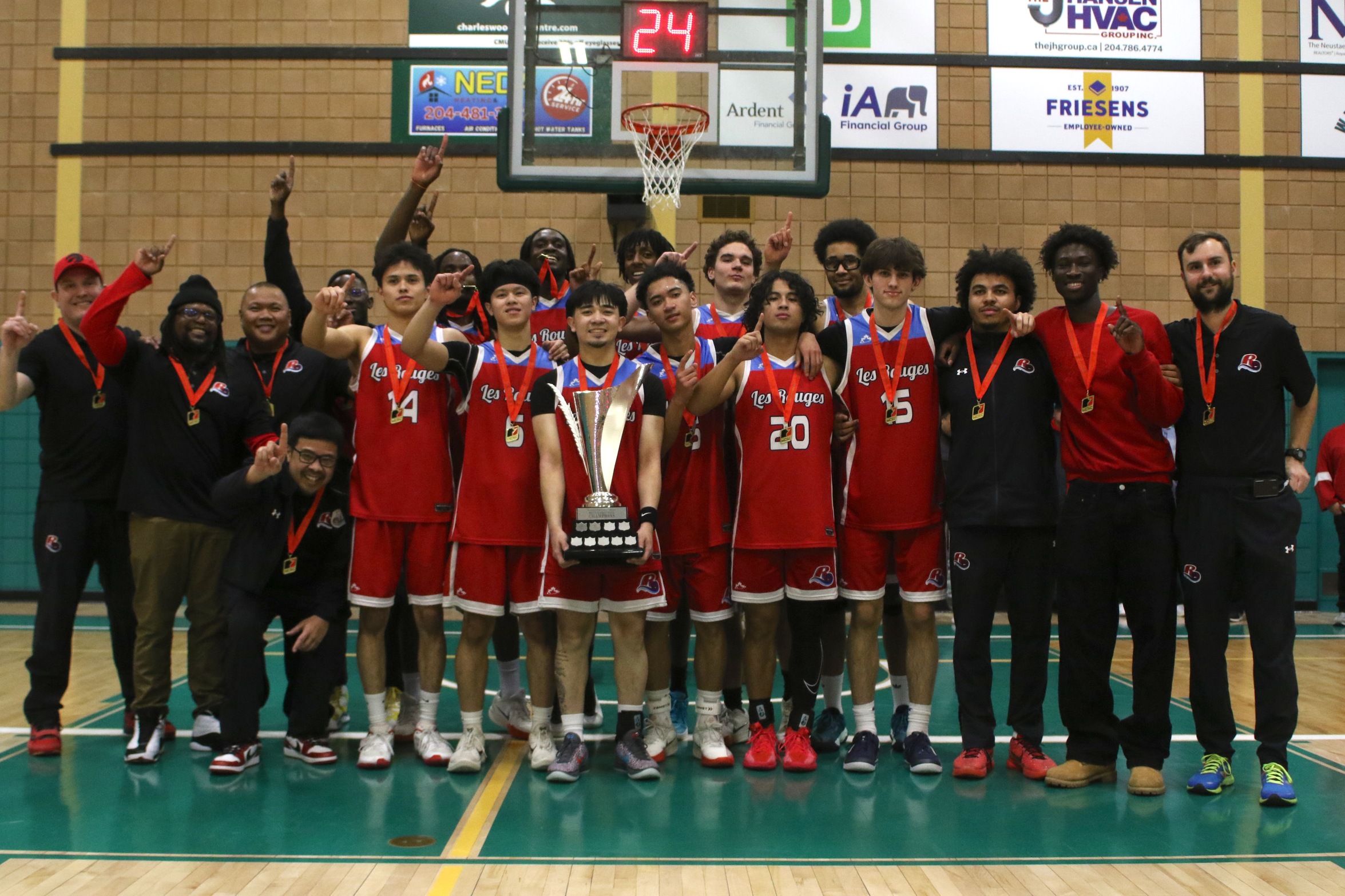 Les Rouges capture first-ever men's basketball championship