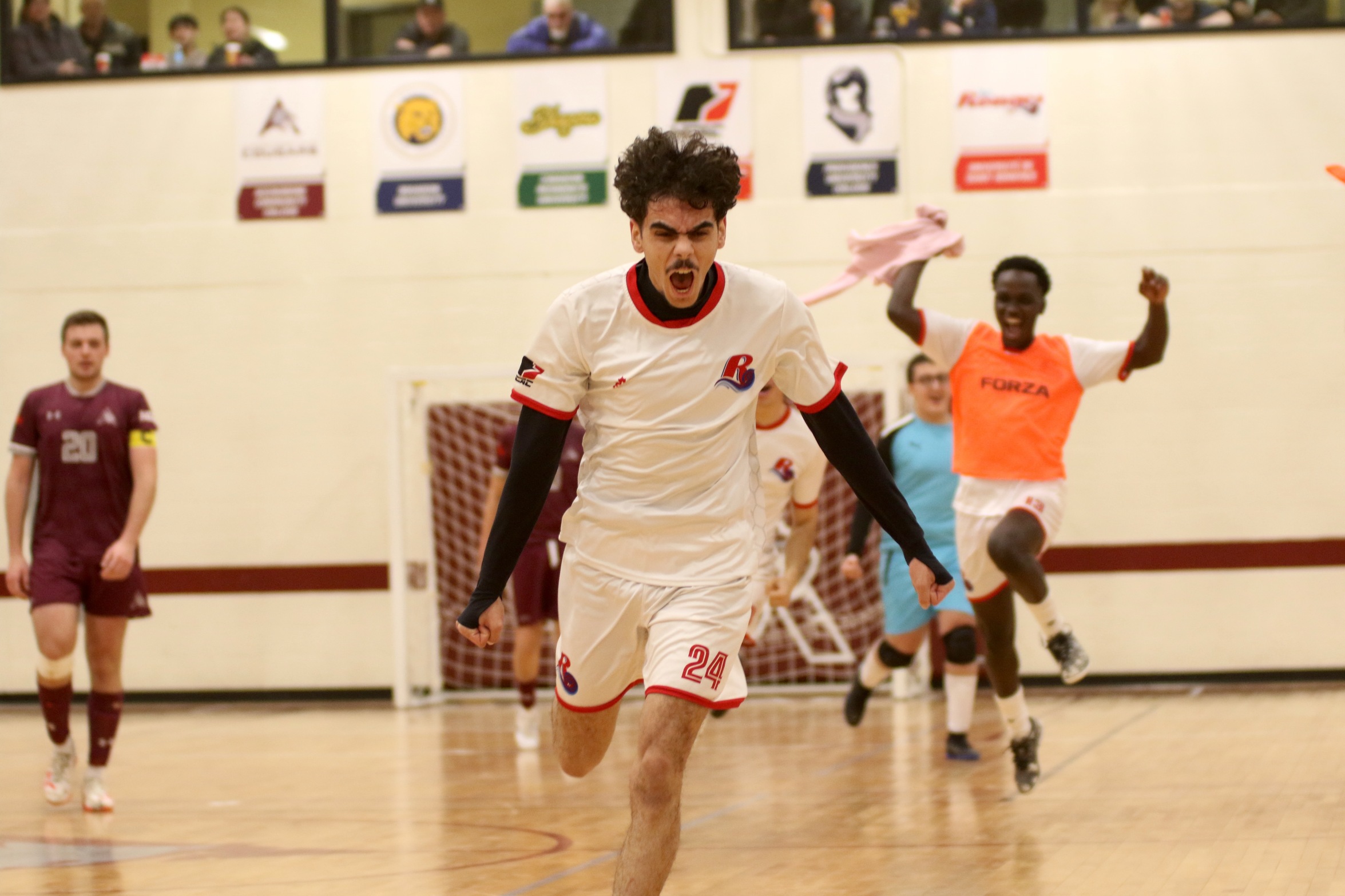 Les Rouges defend men's fustsal title